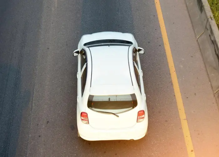 Car Driving on Street